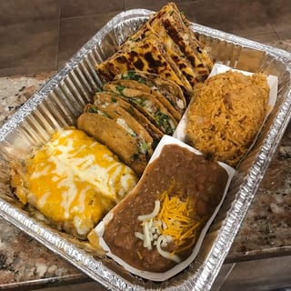 The Sampler - 2 Tacos, 2 Quesadillas, 2 Enchiladas with Sides